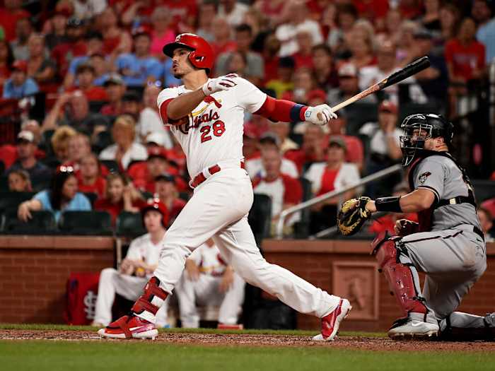 Jun 29, 2021; St. Louis, Missouri, USA; St. Louis Cardinals third baseman Nolan Arenado (28) hits a two run home run against the Arizona Diamondbacks during the fifth inning at Busch Stadium.